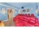 Spacious theater room with comfortable seating, projector, and room for entertaining at 320 O Day, Englewood, FL 34223