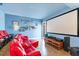Enjoy movie nights in this cozy theater room with plush seating and a large screen at 320 O Day, Englewood, FL 34223