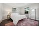 Inviting main bedroom with natural light, TV, and neutral colors at 348 Dorchester Dr, Venice, FL 34293