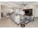 Open-concept living area seamlessly connects the kitchen and dining spaces at 353 Marsh Creek Rd, Venice, FL 34292