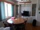 Bright dining room with natural light, great for Gathering meals and entertaining at 358 Longwood Dr, Venice, FL 34285