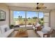 This is a cozy screened in patio with great views and comfortable seating at 406 Cerromar N Cir # 128, Venice, FL 34293