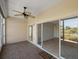This outdoor space features tile floors and multiple doors at 406 Cerromar N Cir # 128, Venice, FL 34293