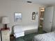 The bedroom includes decor and furniture at 411 Cervina N Dr # 493, Venice, FL 34285