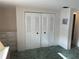 Bedroom with closet featuring louvered doors and dresser with drawers at 411 Cervina N Dr # 493, Venice, FL 34285