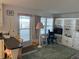 Living room with a partial view of a serving counter at 411 Cervina N Dr # 493, Venice, FL 34285