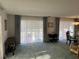 Spacious living room with large windows offering plenty of natural light at 411 Cervina N Dr # 493, Venice, FL 34285