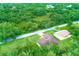 An aerial view of the property highlighting the location and surrounding foliage at 431 Sevilla St, North Port, FL 34287
