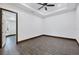 Bright bedroom features wood-look tile flooring and tray ceiling at 431 Sevilla St, North Port, FL 34287