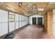 View of the interior of the garage with metal structure and built in shelving at 431 Sevilla St, North Port, FL 34287