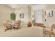 Inviting dining area with a wood table, chairs, and view of the front entry at 4427 Blue Heron Cir, North Port, FL 34287