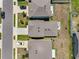 Aerial view of the neighborhood showcases well-maintained homes and verdant lawns at 4523 Birdsong Dr, Palmetto, FL 34221