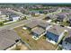 A residential neighborhood with homes interlaced with tranquil ponds and verdant trees is shown at 4523 Birdsong Dr, Palmetto, FL 34221