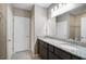 Stylish bathroom with double vanity, granite countertops, and ample storage space at 4523 Birdsong Dr, Palmetto, FL 34221