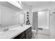 Bright bathroom features a double sink vanity and a shower/tub combination at 4523 Birdsong Dr, Palmetto, FL 34221