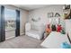 Cozy bedroom with a window, crib, and charming decorations; perfect for a  at 4523 Birdsong Dr, Palmetto, FL 34221
