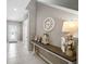 Inviting entryway with neutral paint, a console table, and decorative accents at 4523 Birdsong Dr, Palmetto, FL 34221