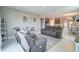 Spacious and well-lit living area, adjacent to the kitchen and dining space at 4523 Birdsong Dr, Palmetto, FL 34221