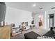 Upstairs loft featuring a play area and view into a bathroom and bedroom at 4523 Birdsong Dr, Palmetto, FL 34221