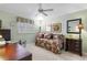 Bedroom with a ceiling fan, decor, and a daybed at 511 Governors Green Dr, Venice, FL 34293