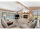 Lovely living room featuring a fireplace, vaulted ceilings, and lots of space at 511 Governors Green Dr, Venice, FL 34293