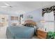 Main bedroom with carpeted floors and bright windows at 511 Governors Green Dr, Venice, FL 34293