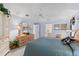 Spacious main bedroom with a dresser, ceiling fan and carpeted floors at 511 Governors Green Dr, Venice, FL 34293