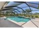 Enjoy the large, screened pool with ample deck space and lush landscaping at 511 Governors Green Dr, Venice, FL 34293