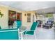 An outdoor patio features a seating area and dining table, perfect for entertaining guests at 542 Clubside Cir # 20, Venice, FL 34293