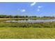 Backyard pond and golf course view at 553 Fallbrook Dr, Venice, FL 34292