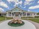 Beautiful building exterior with manicured landscaping and a cozy fire pit at 553 Fallbrook Dr, Venice, FL 34292