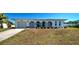 Charming home at 6422 with arched entry, landscaping, and a two-car garage at 6422 Otis Rd, North Port, FL 34287