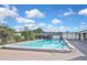 Sparkling pool surrounded by a well-maintained patio and lush landscaping for a relaxing outdoor retreat at 6451 Keena Ct, North Port, FL 34287