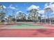 Well-maintained tennis court perfect for recreational play and friendly competition with court-side seating at 6451 Keena Ct, North Port, FL 34287