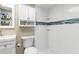 Clean bathroom featuring modern fixtures and tiled walk-in shower at 649 Tamiami S Trl # 106, Venice, FL 34285