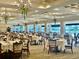 Large, beautifully decorated dining hall with tables set for a special event at 6507 Drewry'S Blf, Bradenton, FL 34203