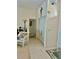 Inviting hallway with neutral tones, tiled flooring, and a welcoming atmosphere at 6507 Drewry'S Blf, Bradenton, FL 34203