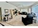 Spacious living room with a ceiling fan and an abundance of natural light at 6507 Drewry'S Blf, Bradenton, FL 34203