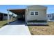 Charming single-story home with covered parking and easy access driveway at 6765 Laurel Ct, North Port, FL 34287