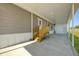 Large carport with covered entry to the home at 6803 Amoko Ct, North Port, FL 34287