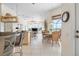 Inviting breakfast nook off the kitchen with a view of outdoor living space and pool at 872 Macaw Cir, Venice, FL 34285