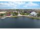 Attractive waterfront community with inviting lakefront amenities and beautiful landscaping at 872 Macaw Cir, Venice, FL 34285