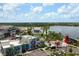 Picturesque view showcasing an attractive community with lakefront access and colorful recreational areas at 872 Macaw Cir, Venice, FL 34285