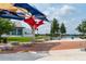 Inviting community space featuring modern seating, lush landscaping, and a serene waterfront view at 872 Macaw Cir, Venice, FL 34285