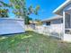 Spacious backyard with shed and white picket fence at 985 Everest Rd, Venice, FL 34293