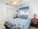 Bedroom with closet, window, and a nautical themed comforter at 985 Everest Rd, Venice, FL 34293