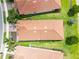 An aerial view of the home showing its position among manicured lawns and community landscaping at 10093 Cozy Grove Dr, Venice, FL 34293