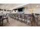 Fully stocked bar area with plenty of seating, great for socializing and enjoying drinks at 10093 Cozy Grove Dr, Venice, FL 34293