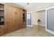 Versatile bedroom with built-in shelving, murphy bed and access to another living area, ideal for guests or a home office at 10093 Cozy Grove Dr, Venice, FL 34293