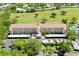 Beautiful condo complex with golf course views, lush landscaping, and convenient covered parking at 1018 Wexford Blvd # 1018, Venice, FL 34293